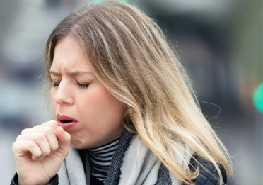Lady coughing
