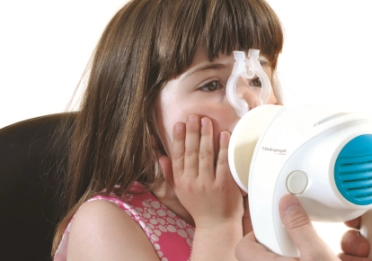 Girl using Tremoflo oscillometer