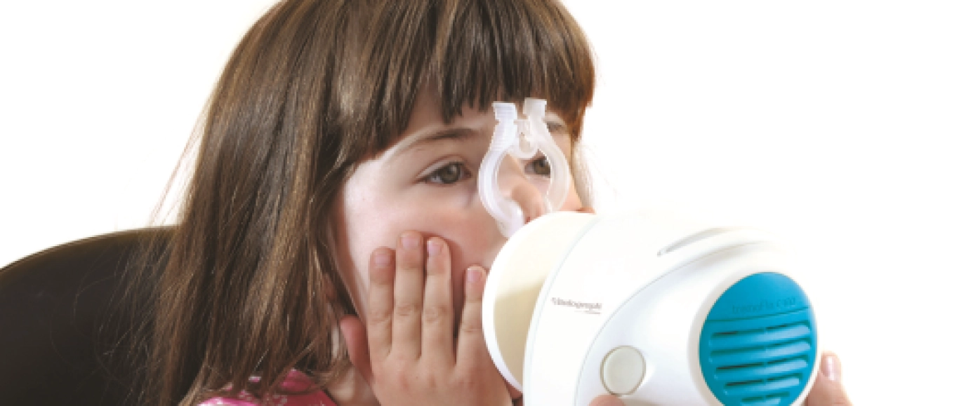 Girl using Tremoflo oscillometer