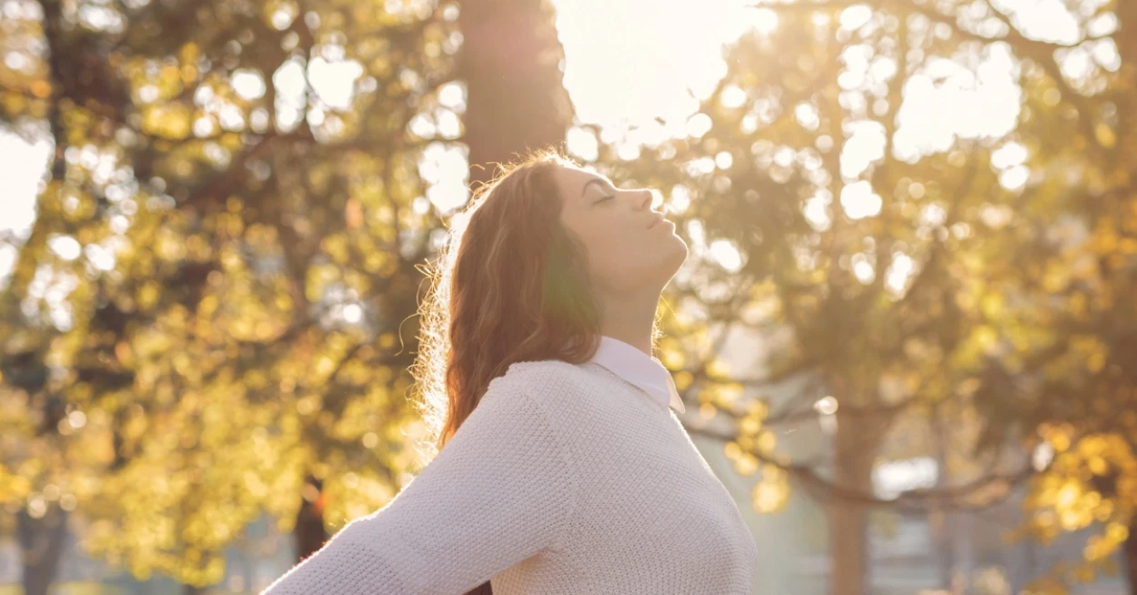 Lady outside in sunshine